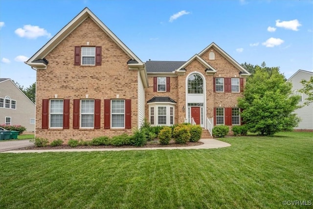 156 Hawk Nest Ct, Richmond, VA 23227 - view of front of home with brick siding and a front yard