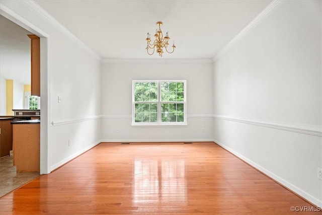 156 Hawk Nest Ct, Richmond, VA 23227 - unfurnished dining area with crown molding, wood finished floors, a chandelier, and baseboards