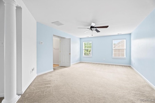 156 Hawk Nest Ct, Richmond, VA 23227 - empty room featuring a ceiling fan, light carpet, decorative columns, and baseboards