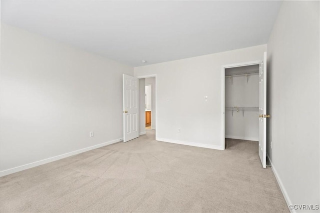 156 Hawk Nest Ct, Richmond, VA 23227 - unfurnished bedroom with light colored carpet, baseboards, a spacious closet, and a closet
