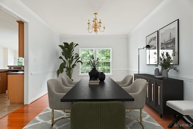 156 Hawk Nest Ct, Richmond, VA 23227 - dining space with ornamental molding, light wood-type flooring, and a chandelier