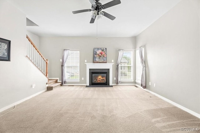 156 Hawk Nest Ct, Richmond, VA 23227 - unfurnished living room with stairway, carpet, a fireplace with flush hearth, and ceiling fan