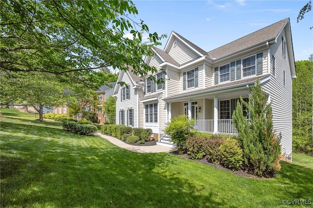 exterior space featuring a front yard and covered porch