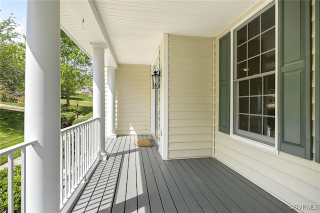 wooden deck featuring covered porch