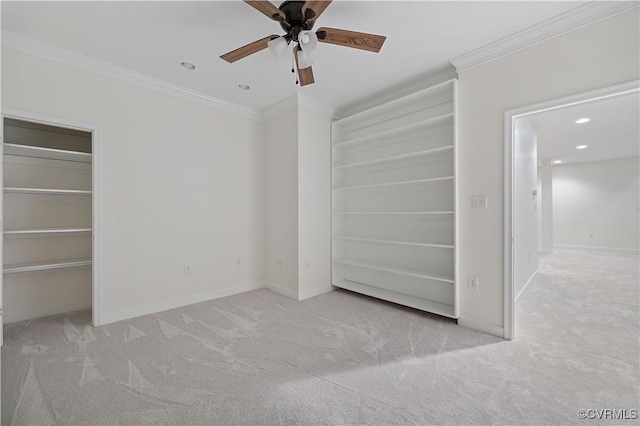 interior space featuring crown molding, baseboards, a ceiling fan, and recessed lighting