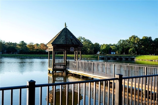dock area featuring a water view
