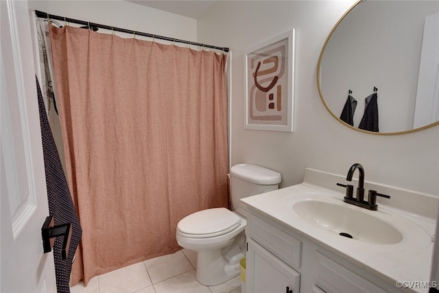 full bathroom with vanity, tile patterned floors, and toilet