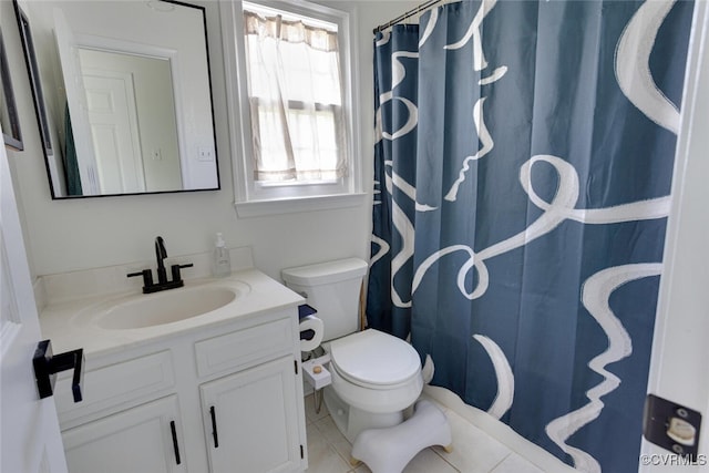 bathroom with toilet, tile patterned floors, a shower with curtain, and vanity