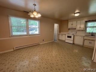 kitchen featuring white cabinetry, a baseboard heating unit, under cabinet range hood, an inviting chandelier, and white appliances