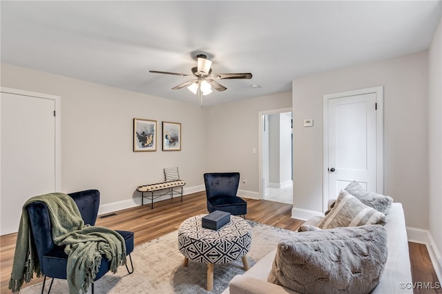 21300 W St, South Chesterfield, VA 23803 - living room featuring baseboards, wood finished floors, and a ceiling fan
