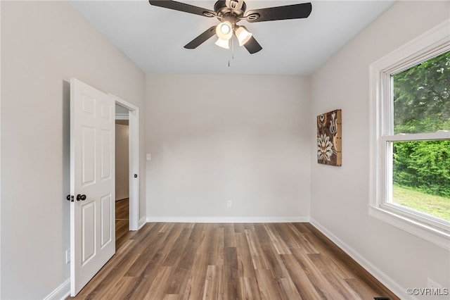 21300 W St, South Chesterfield, VA 23803 - spare room with wood finished floors, a ceiling fan, and baseboards