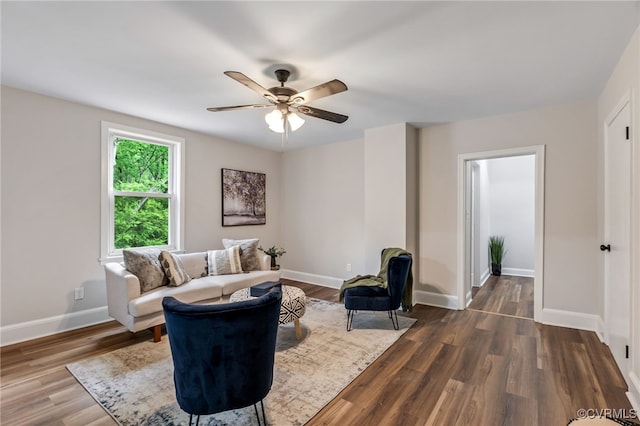 21300 W St, South Chesterfield, VA 23803 - living area featuring baseboards, ceiling fan, and dark wood-style flooring