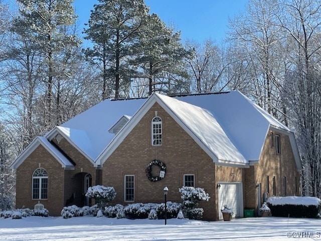 view of front of house with brick siding