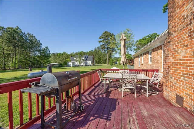 204 Pine St, Jarratt, VA 23867 - wooden terrace with a lawn, outdoor dining space, and a grill