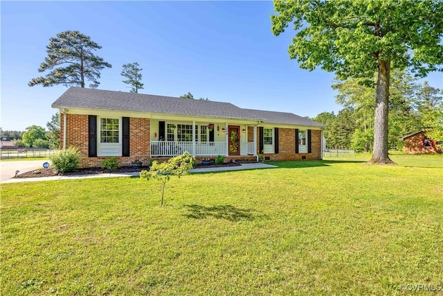 204 Pine St, Jarratt, VA 23867 - ranch-style home with a porch, a front lawn, fence, and brick siding
