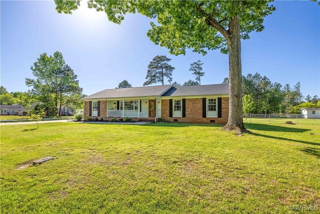 204 Pine St, Jarratt, VA 23867 - ranch-style home with fence, a front lawn, and crawl space