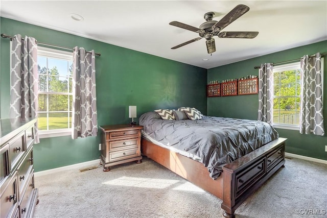 204 Pine St, Jarratt, VA 23867 - bedroom featuring baseboards, carpet flooring, visible vents, and multiple windows