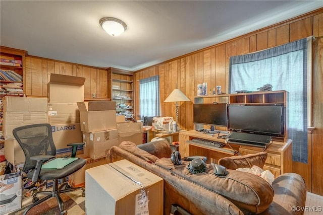 interior space featuring wood walls