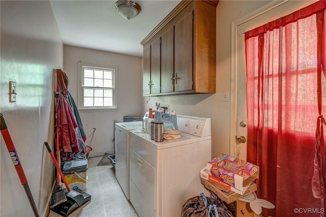 laundry area featuring cabinet space and washing machine and clothes dryer