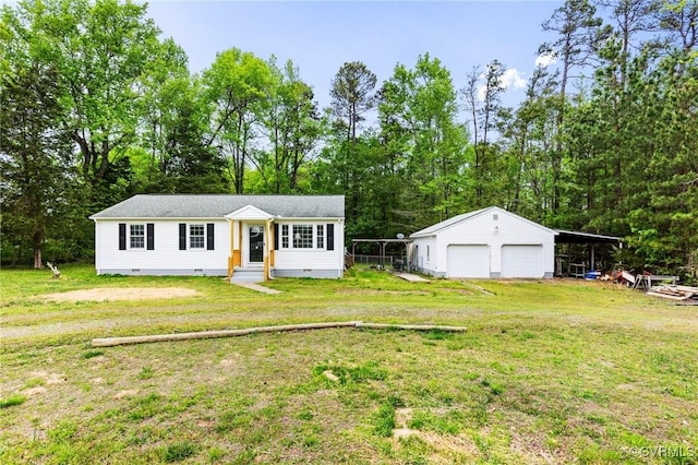 view of front facade with entry steps, a detached garage, an outbuilding, a front yard, and crawl space