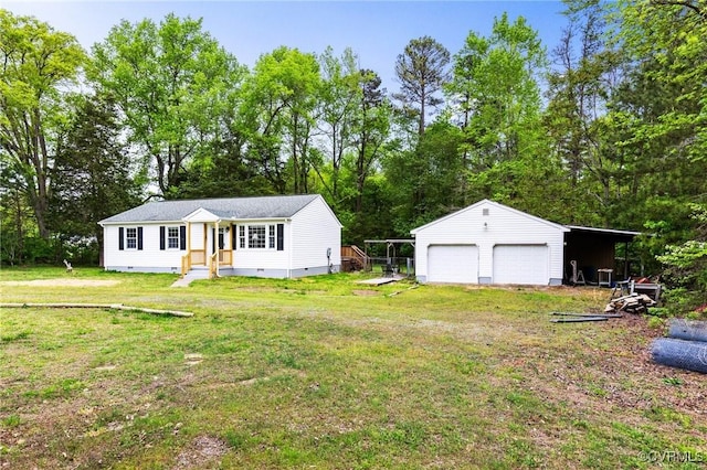 view of front of home featuring an outdoor structure, a detached garage, crawl space, and a front lawn