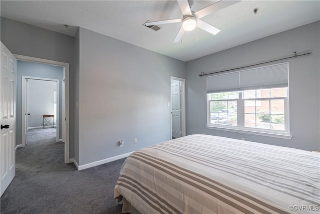 bedroom featuring carpet flooring, baseboards, and a ceiling fan