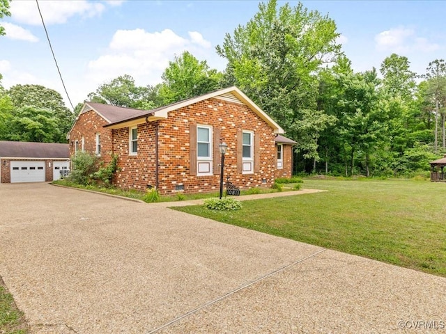 10811 Shady Ln, Charles City, VA 23030 - view of front of home with brick siding, crawl space, a detached garage, a front lawn, and a shingled roof