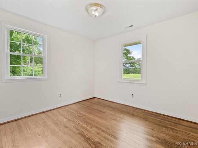 10811 Shady Ln, Charles City, VA 23030 - empty room featuring wood finished floors and baseboards