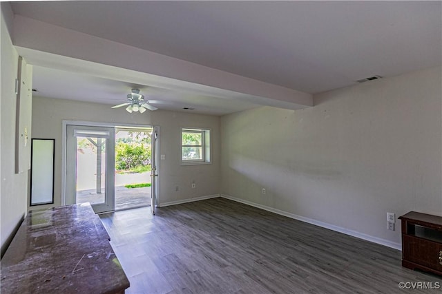 10 Mahon, Ruther Glen, VA 22546 - unfurnished living room featuring wood finished floors, ceiling fan, and baseboards