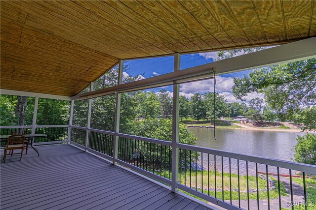 10 Mahon, Ruther Glen, VA 22546 - unfurnished sunroom with a water view, lofted ceiling, and view of wooded area