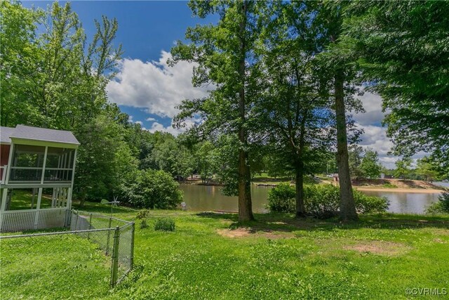 10 Mahon, Ruther Glen, VA 22546 - view of yard with a water view and a sunroom
