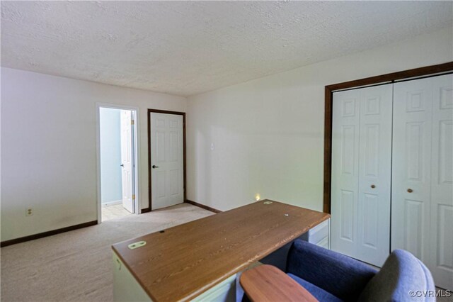 10 Mahon, Ruther Glen, VA 22546 - home office with light colored carpet, a textured ceiling, and baseboards