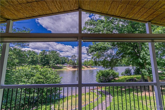 10 Mahon, Ruther Glen, VA 22546 - unfurnished sunroom with a water view, lofted ceiling, and view of scattered trees