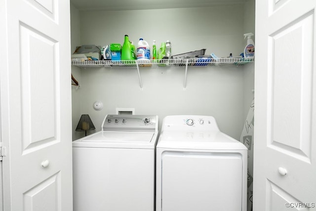 laundry area featuring independent washer and dryer and laundry area