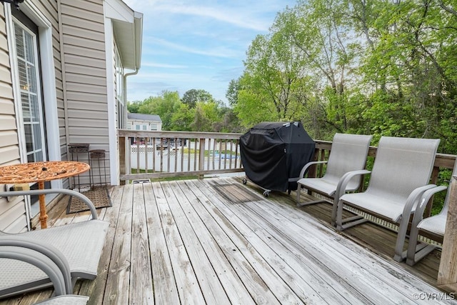 wooden terrace with grilling area