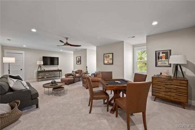 dining room with visible vents, recessed lighting, ceiling fan, and light colored carpet