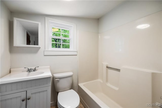 full bath featuring toilet and vanity