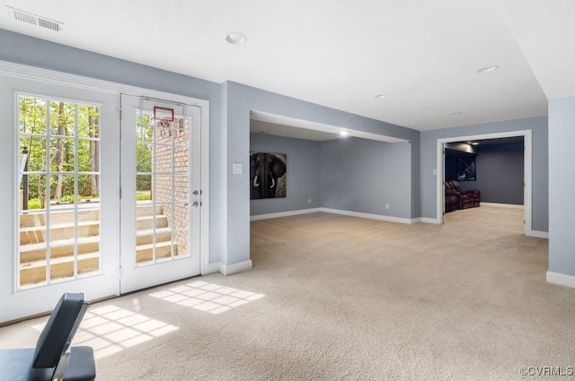 interior space with baseboards, visible vents, carpet flooring, and recessed lighting