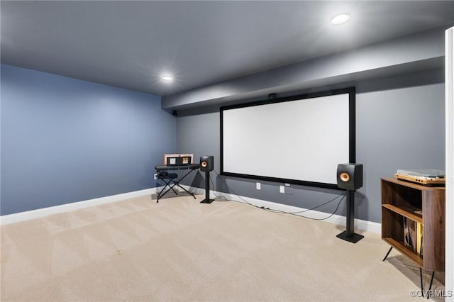 carpeted cinema room featuring recessed lighting and baseboards