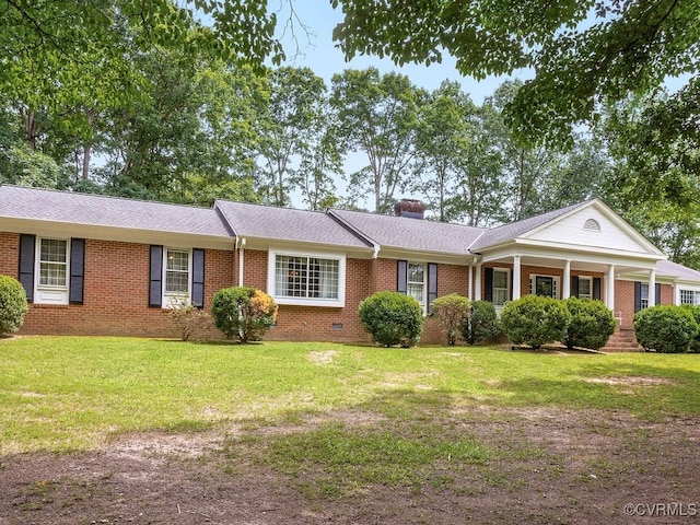 1735 Old Powhatan Ests, Powhatan, VA 23139 - ranch-style home with brick siding, a front yard, a chimney, and roof with shingles