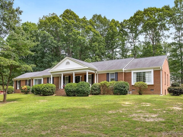 1735 Old Powhatan Ests, Powhatan, VA 23139 - neoclassical home with brick siding, a porch, a front lawn, and crawl space