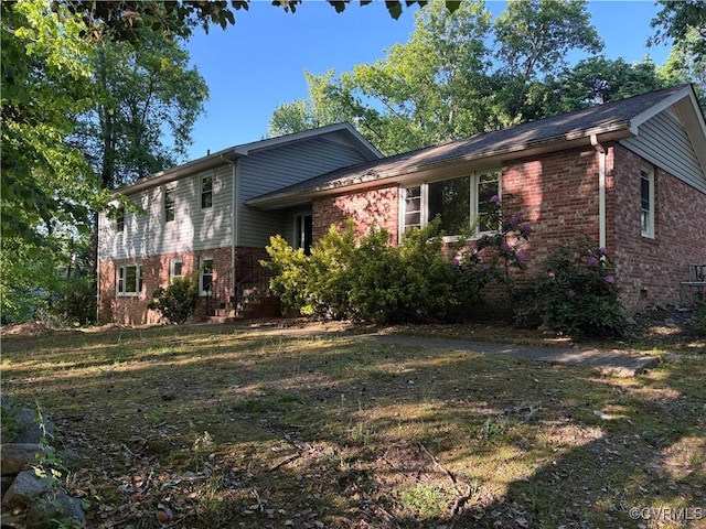 13101 Harrowgate Rd, Chester, VA 23831 - tri-level home featuring brick siding and a front yard
