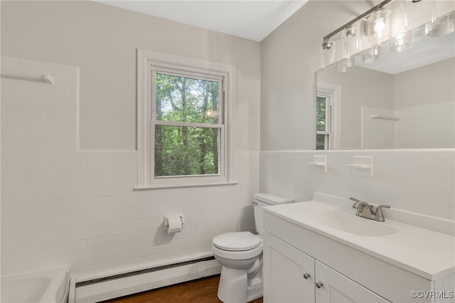13101 Harrowgate Rd, Chester, VA 23831 - full bathroom featuring a baseboard radiator, tile walls, toilet, vanity, and a shower