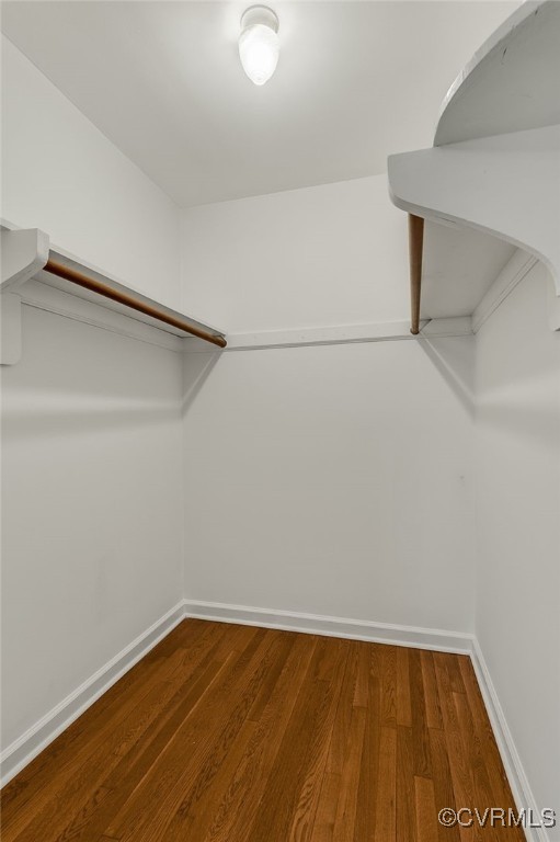 13101 Harrowgate Rd, Chester, VA 23831 - walk in closet featuring wood finished floors