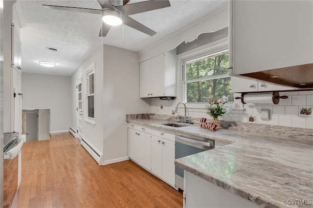 13101 Harrowgate Rd, Chester, VA 23831 - kitchen with a sink, dishwasher, a textured ceiling, a baseboard heating unit, and tasteful backsplash