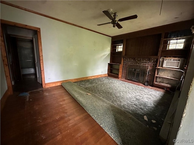 5820 Hermitage Rd, Henrico, VA 23228 - unfurnished living room with a brick fireplace, ceiling fan, crown molding, baseboards, and wood finished floors