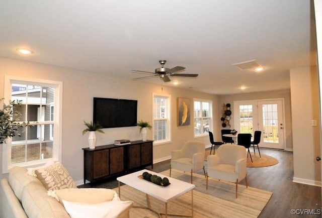 living room with recessed lighting, wood finished floors, baseboards, visible vents, and a ceiling fan