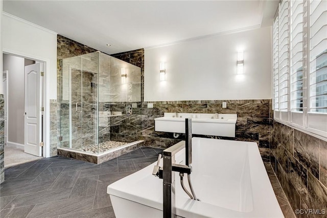 9073 Pine Hill Rd, Mechanicsville, VA 23116 - full bath with tile walls, a shower stall, a soaking tub, ornamental molding, and wainscoting