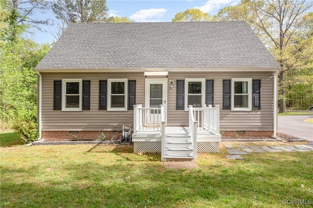 15131 Burruss Ln, Ruther Glen, VA 22546 - cape cod house with crawl space, a front lawn, and roof with shingles