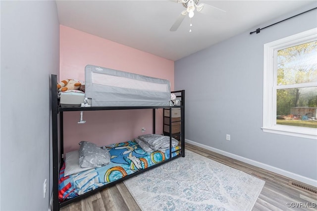 15131 Burruss Ln, Ruther Glen, VA 22546 - bedroom with wood finished floors, baseboards, and ceiling fan